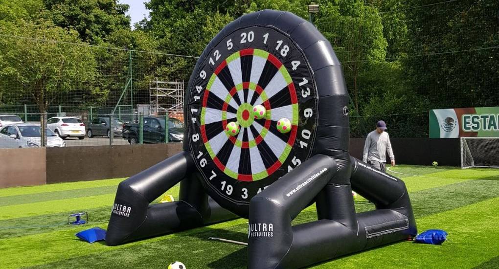 Group on a stag do play footdarts