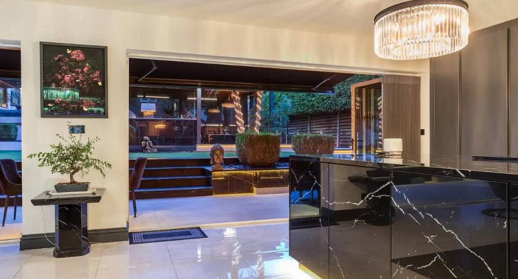 Hen party house kitchen with garden view