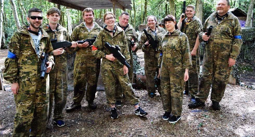 Stags and Hens pose for a photo before playing laser tag